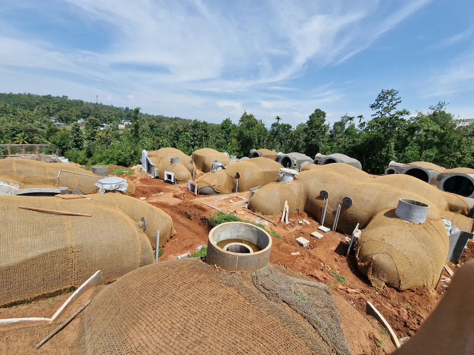 Cluster of ferrocement eco-domes under construction at Pulpally, Wayanad